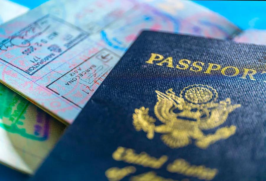 Is it necessary to have both a passport book and a passport card?