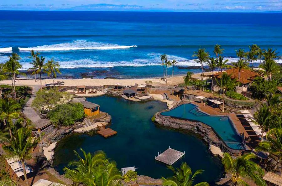 Experience a 1.8 million-gallon aquarium at this Hawaii resort, where you can swim alongside marine biologists.