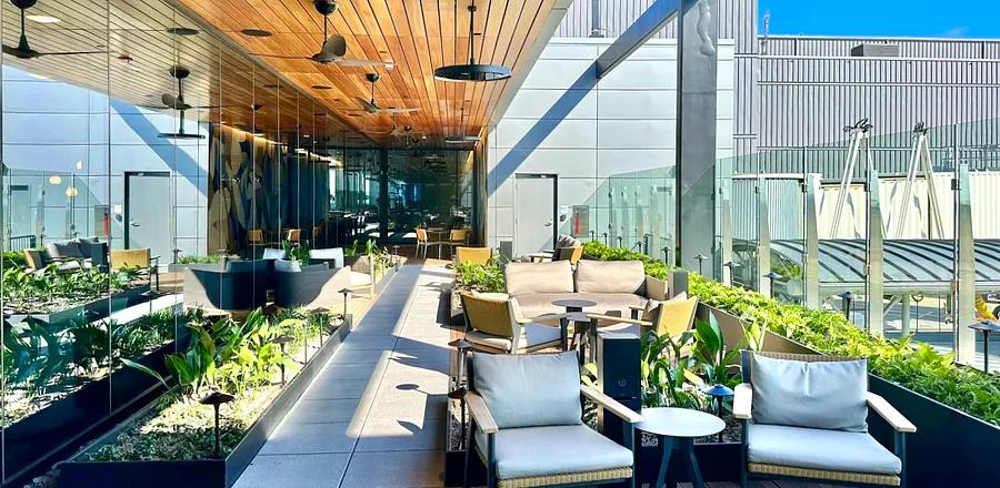 Outdoor Decks, Comforting Soul Food, and a Whiskey Bar: AmEx Launches Its Largest Airport Lounge in Atlanta