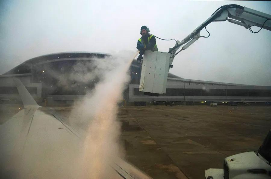 The process of aircraft de-icing