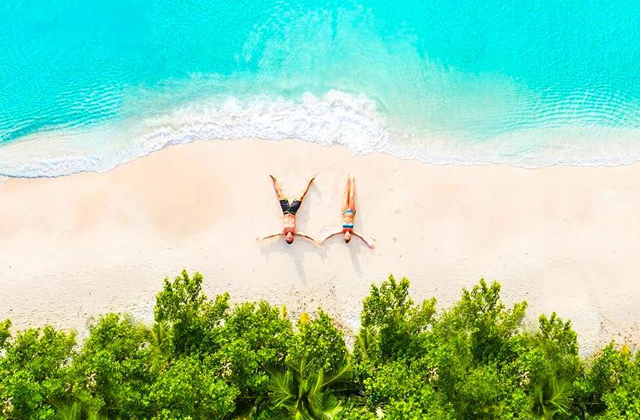 Exchange Snow Angels for Sand Angels This Winter