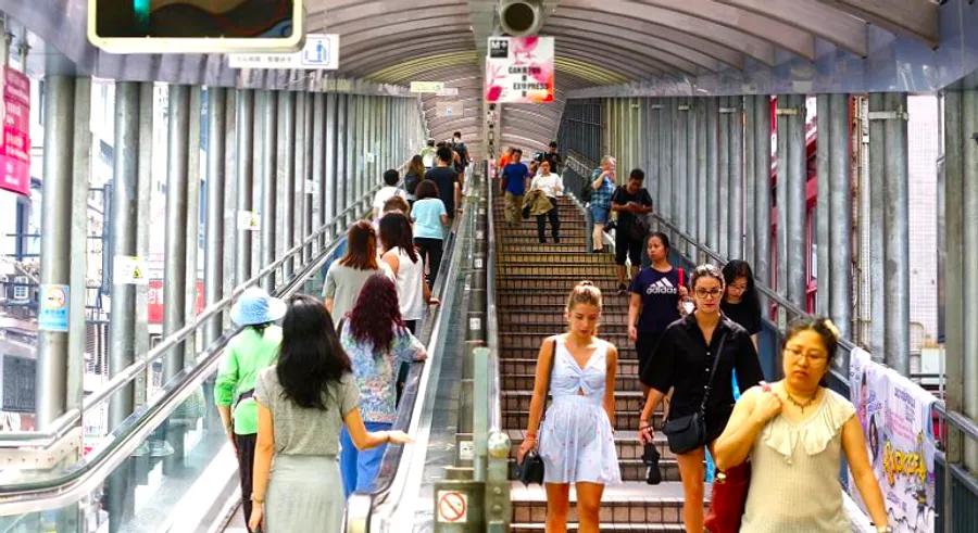 Uncover the fascinating tale behind the creation of the world’s longest outdoor escalator system.