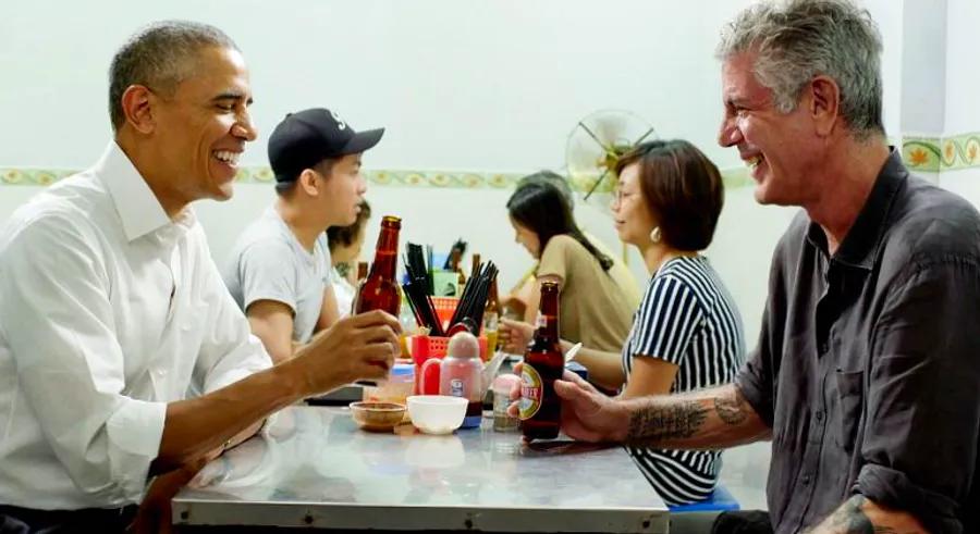 Barack Obama and Anthony Bourdain sit down for a candid conversation in Hanoi, sharing a meal and insights.