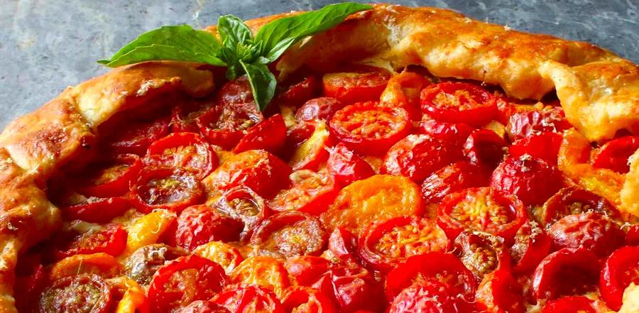 Chef John's Rustic French Tomato Galette is the perfect way to make the most of your summer tomatoes. This simple yet delicious dish showcases the best of the season’s produce.