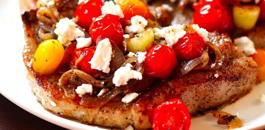 Pan-Seared Pork Chops with Fresh Tomatoes, Onions, Garlic, and Crumbled Feta