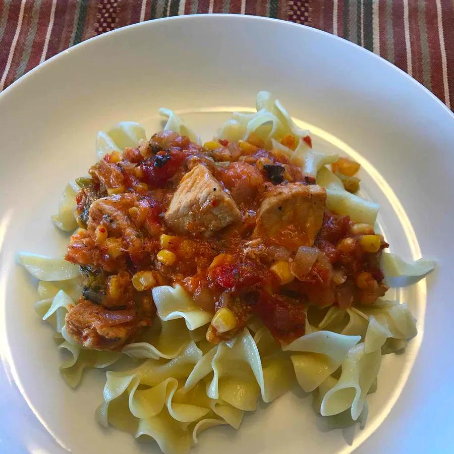 Cuban Goulash: A savory and exotic dish combining tender pork, sweet bananas, and tangy tomatoes for a deliciously unique meal.