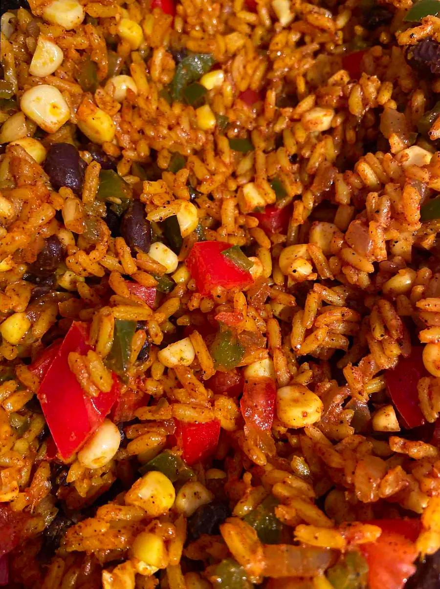 Savory and hearty Dirty Rice, a flavorful dish full of vibrant ingredients and bold spices.