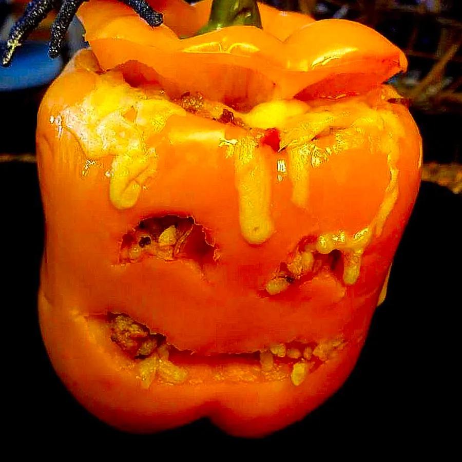 Halloween Jack-O'-Lantern Stuffed Peppers