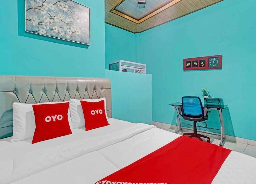 Cover Image for OYO 90602 Guest House Marisa Syariah