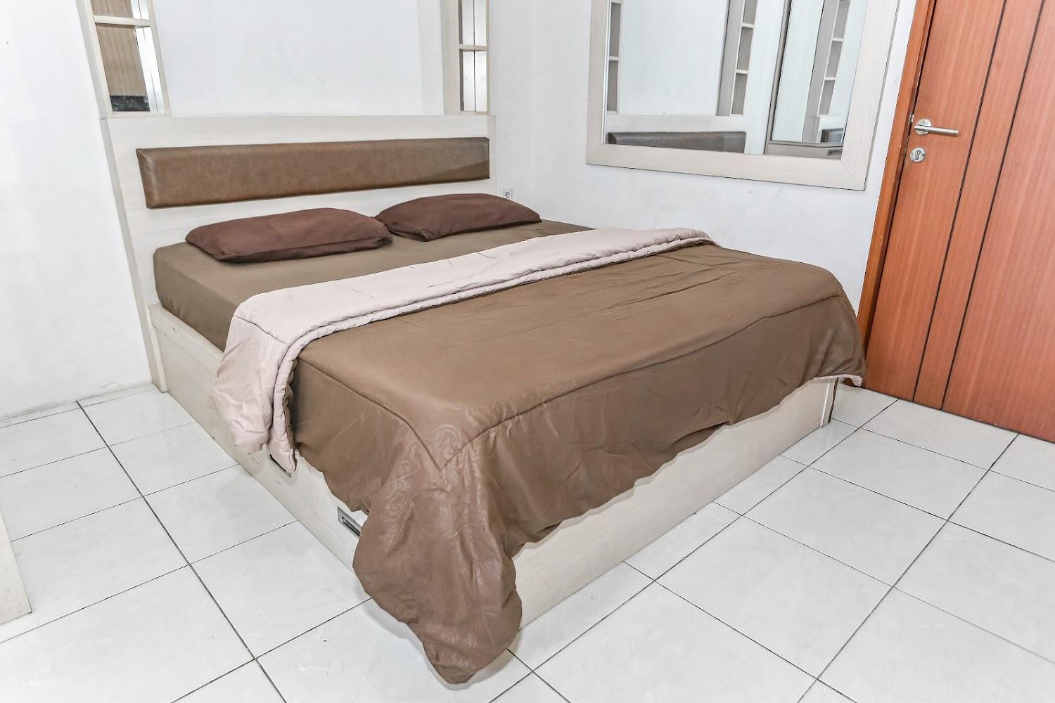 Cover Image for RedLiving Apartemen Green Lake View Ciputat - Juragan Rooms Tower B with Fast Wifi