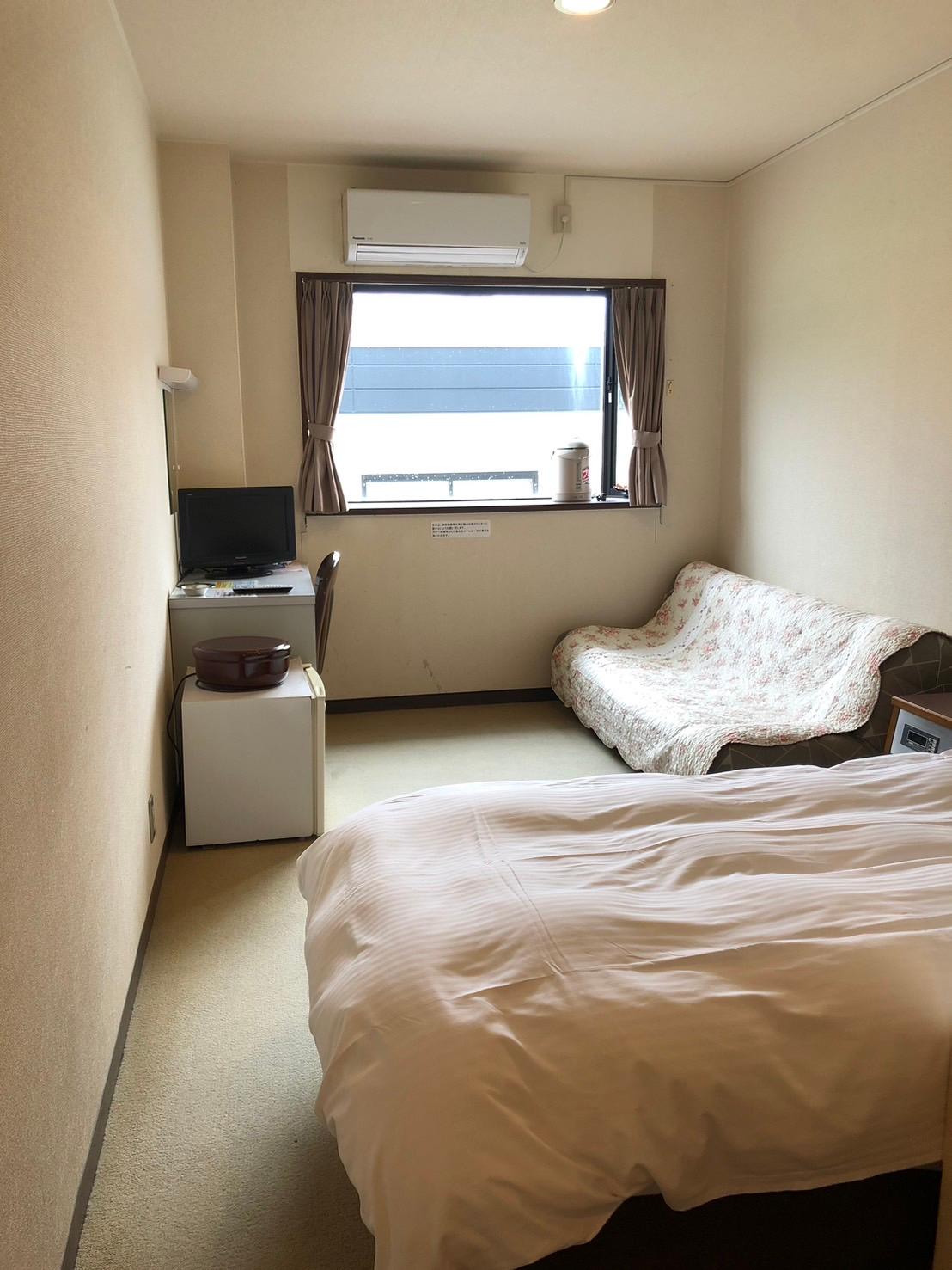 Cover Image for Business Hotel Marutomi