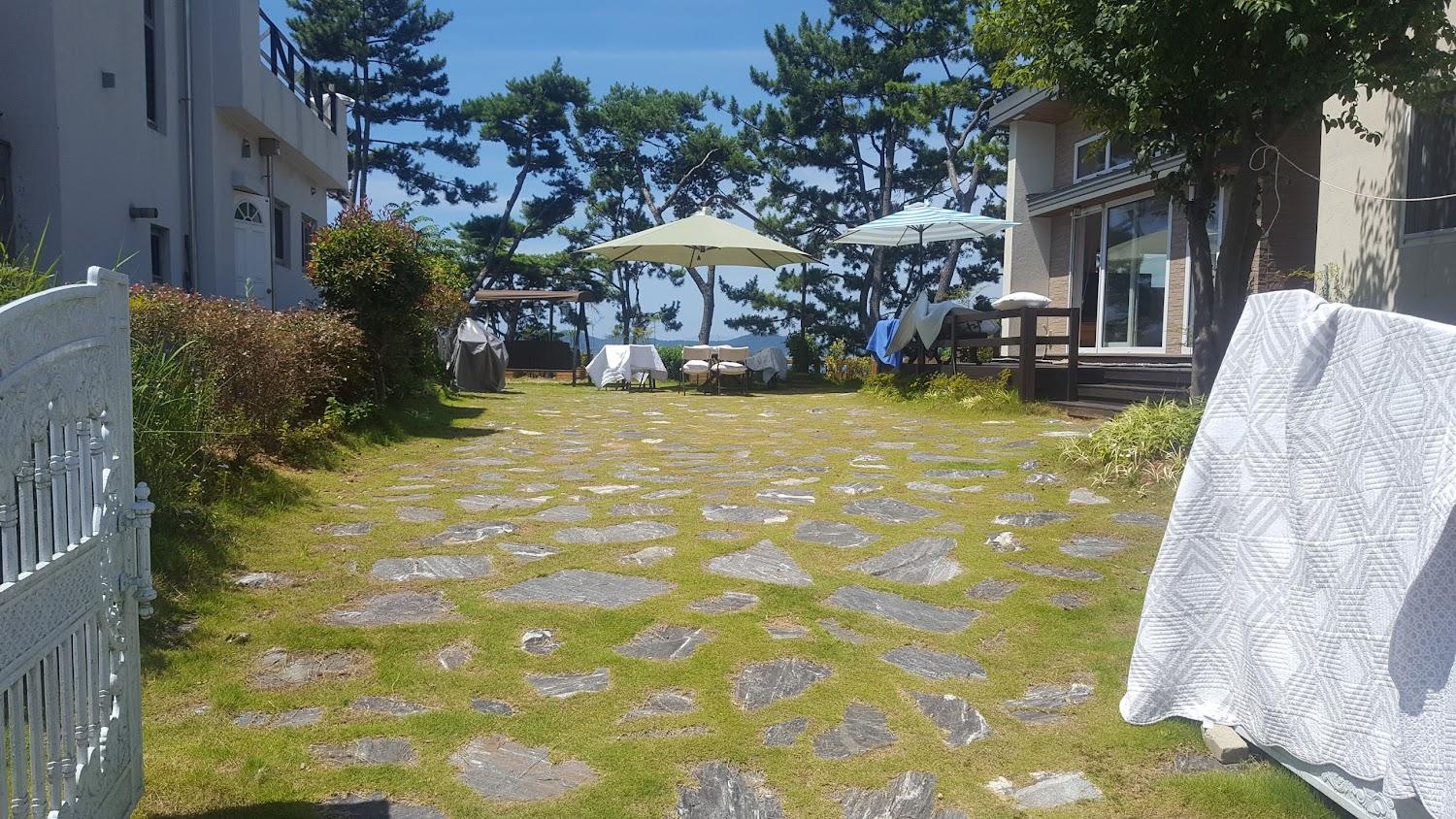 Cover Image for Sea Bed and Breakfast garden on the hill