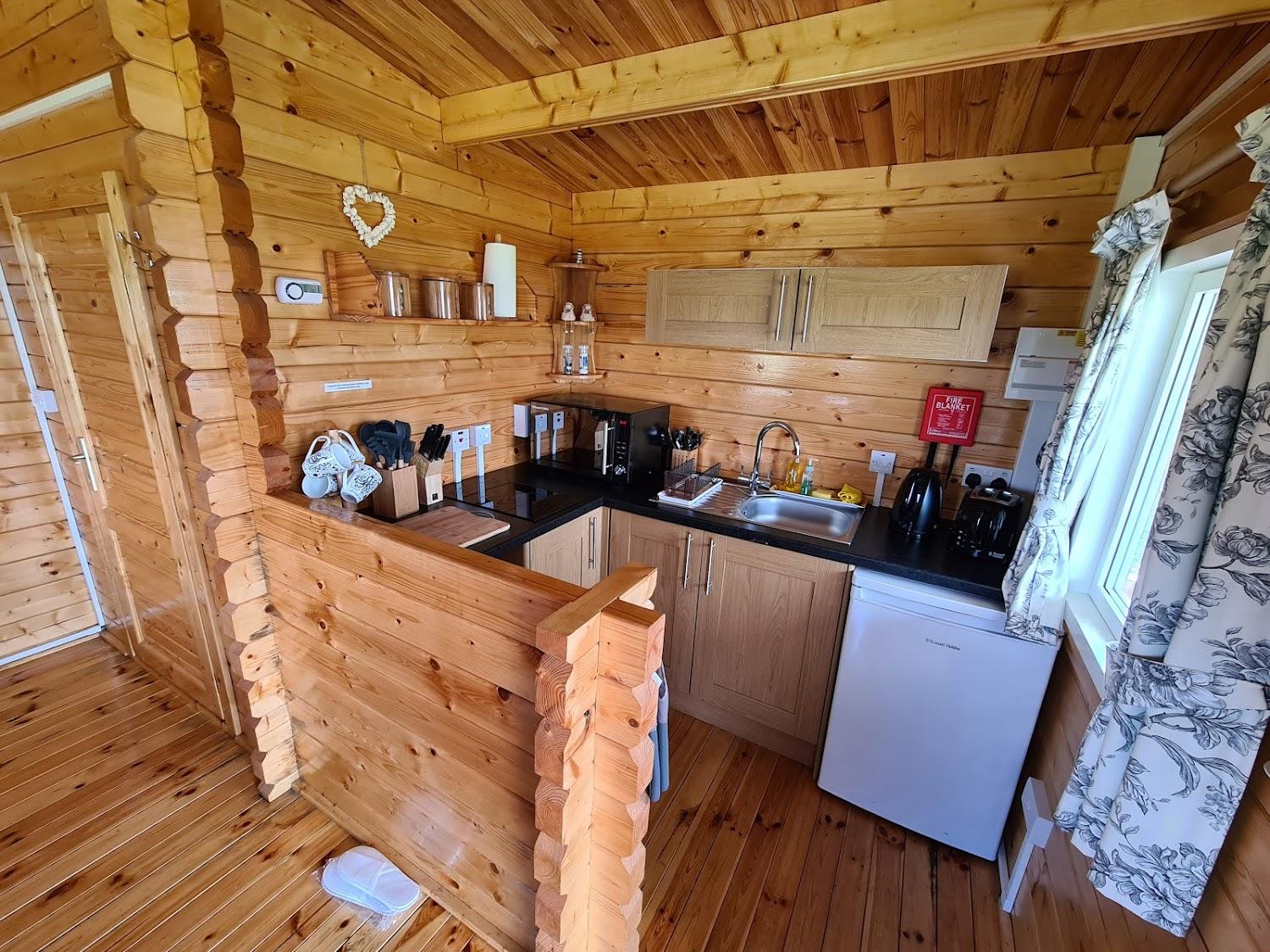 Cover Image for Harlosh Log Cabins