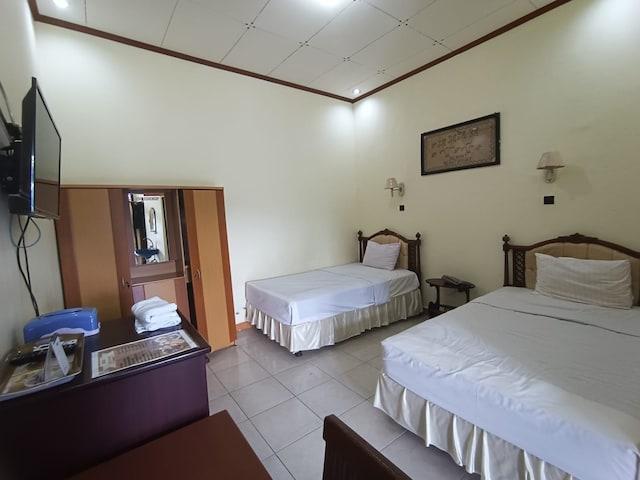 Cover Image for OYO 92639 Ervina Homestay Syariah Batakan