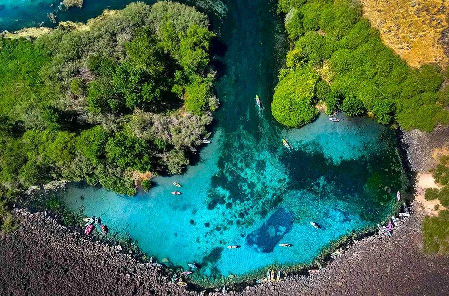 Cover Image for Idaho's 'Blue Heart Spring' Is One of the State's Best-kept Secrets — Featuring Stunning, Caribbean-blue Waters Hidden Behind a Forested Passageway