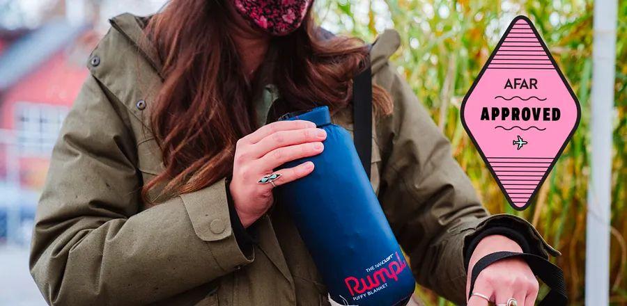 Cover Image for This Rumpl Travel Blanket is My Must-Have for Every Long-Haul Flight—and It's Currently 25% Off