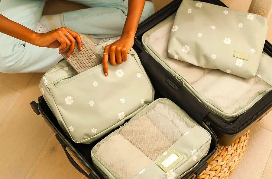 Cover Image for I travel nearly 100,000 miles annually and never leave home without my Calpak packing cubes.