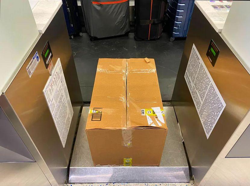 Cover Image for The story behind how I managed to check a large cardboard box of complimentary food on my last flight.