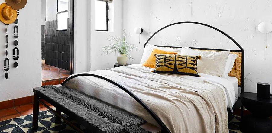 Cover Image for Bobby Berk from "Queer Eye" Has Just Listed His Stunning Palm Desert Home on Airbnb