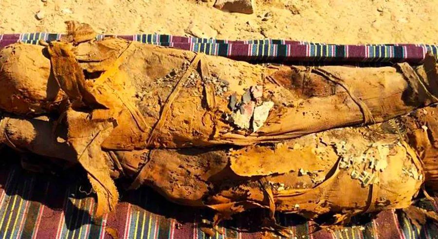 Cover Image for A hidden Egyptian tomb has yielded a discovery of at least 34 mummies.