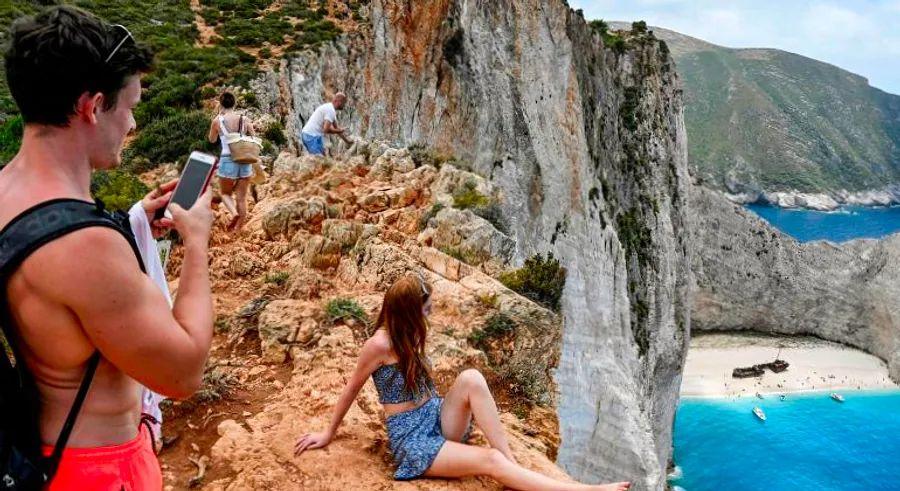 Cover Image for Greece, starving for tourism, takes a bold gamble on Covid by reopening its doors to visitors, risking both the future of its tourism industry and its ability to handle the ongoing pandemic.