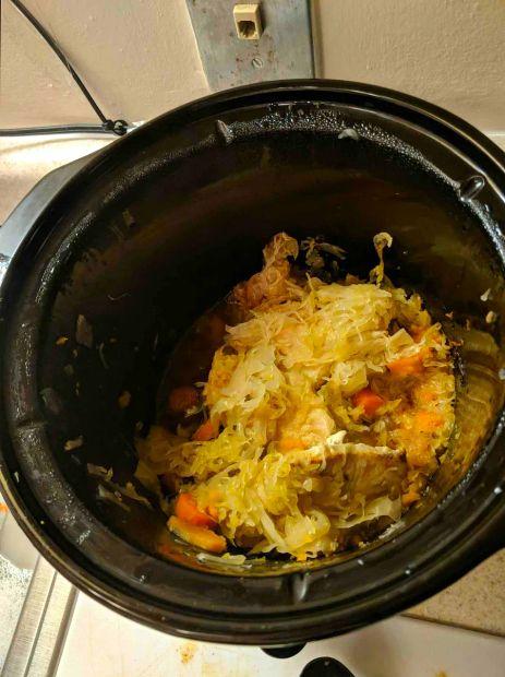 Cover Image for Pork Chops with Apples, Sweet Potatoes, and Sauerkraut - A perfect blend of savory pork, sweet apples, hearty sweet potatoes, and tangy sauerkraut, slow-cooked to perfection.