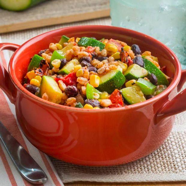 Cover Image for Zucchini, black beans, fire-roasted tomatoes, and farro come together in this vibrant vegetarian skillet dish.