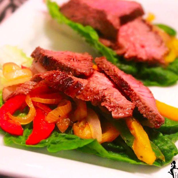 Cover Image for Sizzlin' Fajitas: A sizzling and flavorful dish that's perfect for any occasion, combining tender meat with vibrant seasonings.