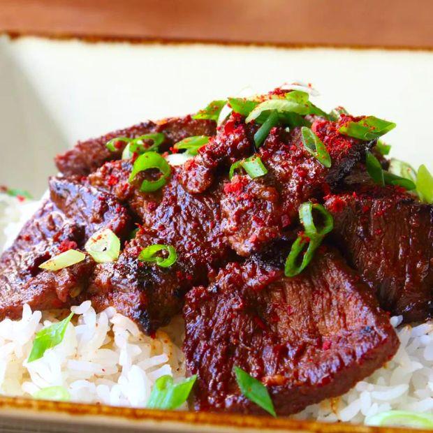 Cover Image for What is Bulgogi? A beloved Korean dish that features thinly sliced beef, grilled to perfection with a sweet and savory glaze.