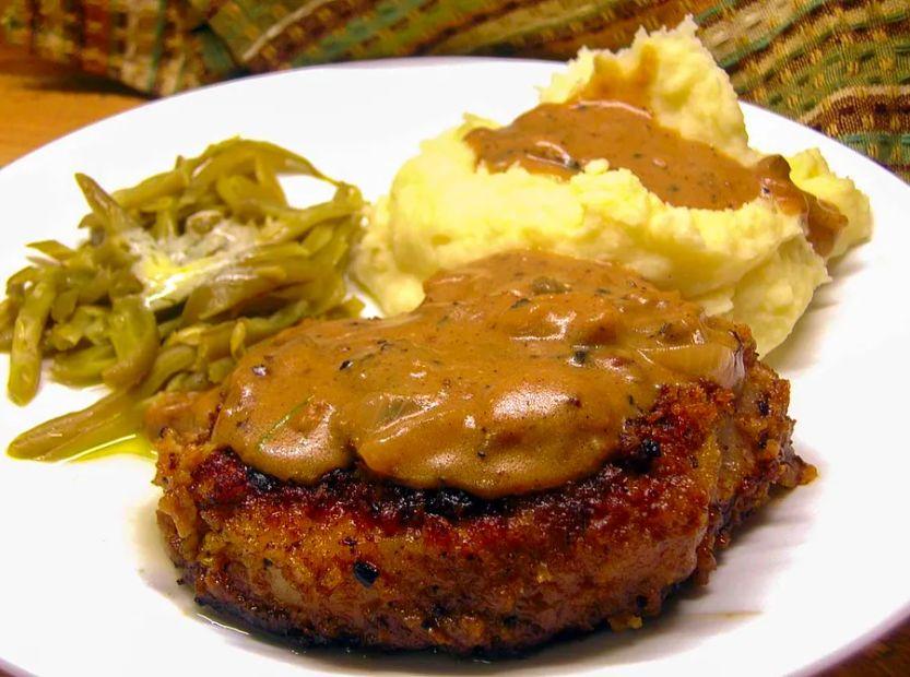 Cover Image for Grandma's Savory Pork Chops in Rich Mushroom Gravy