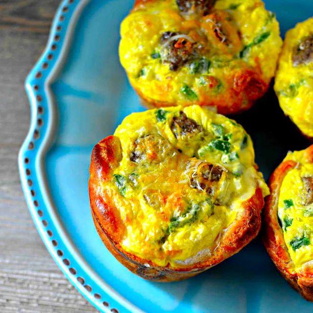 Cover Image for Breakfast Pies: Savory, handheld breakfast treats with a flaky biscuit crust, filled with sausage, eggs, and cheese. A satisfying way to start your day.